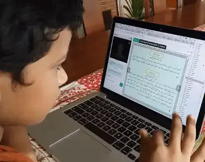 Student in a live online Quran video class
